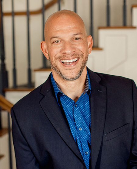 Headshot of Nic Carter, Executive Director of Risk Services at Hatcher Insurance in Orlando, FL